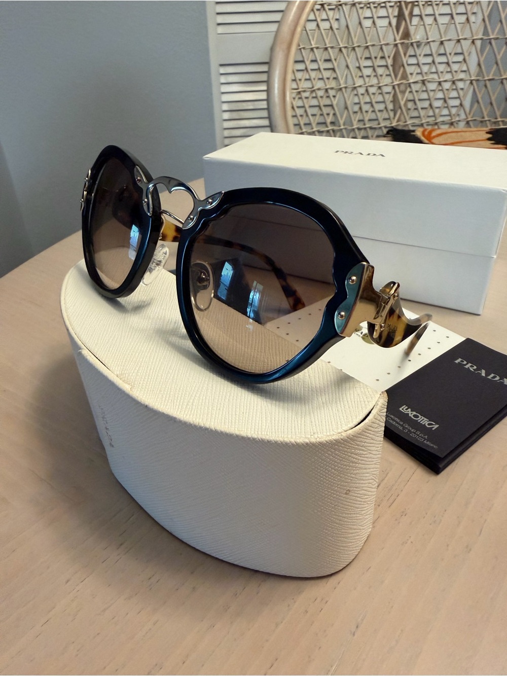 Prada Wanderer PR 09TS 1AB-3D0 Black Round Women's Sunglasses with Gold Accents